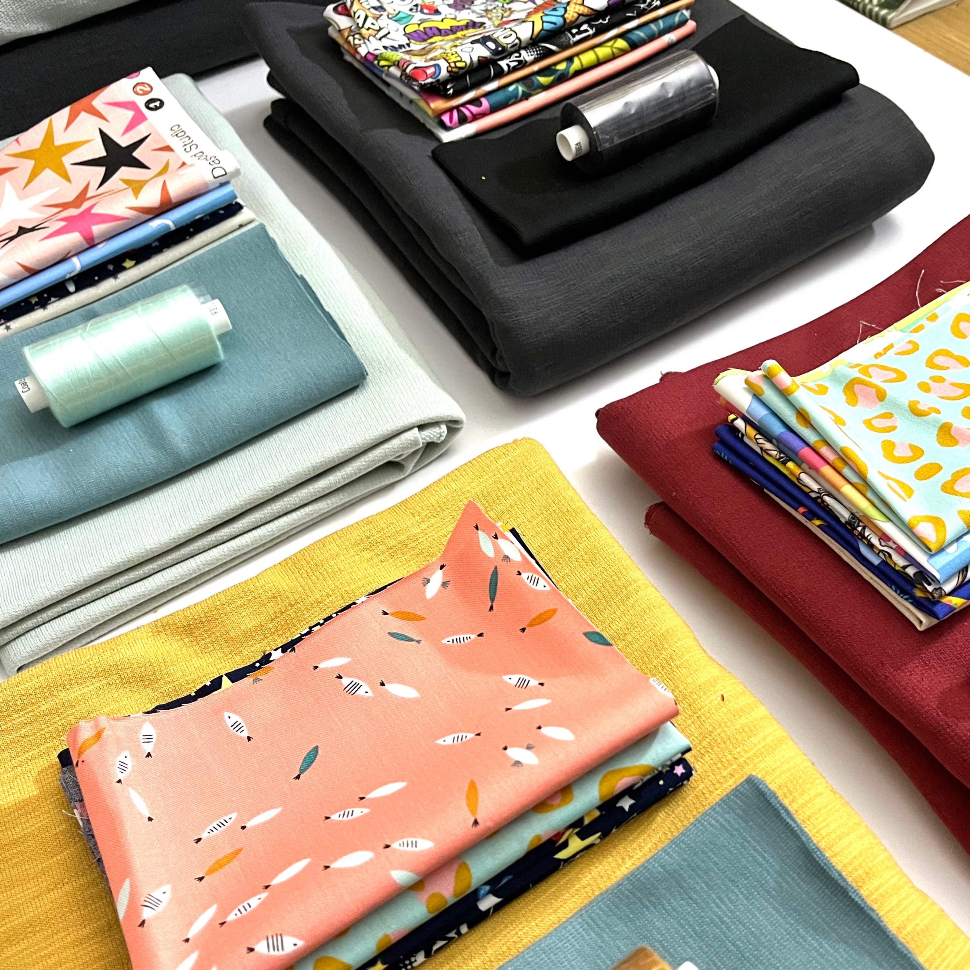 A selection of fabrics and thread from Becky - Pattern Paper Scissors